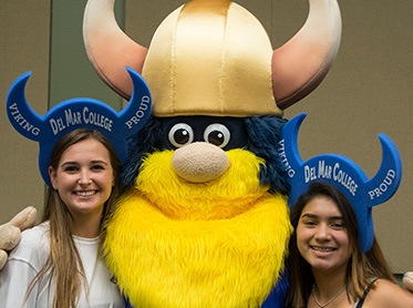 Valdar two students smile for the camera