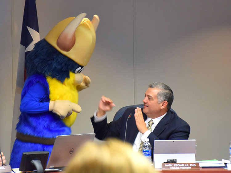 Dr. Mark Escamilla sparring with Viking mascot