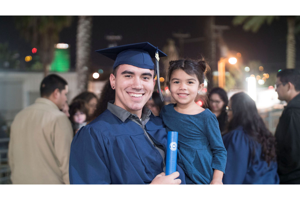 Del Mar College accounting graduate with his daughter