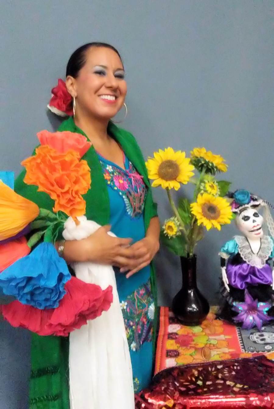 Teresa Saldivar posing in her folklorico dress