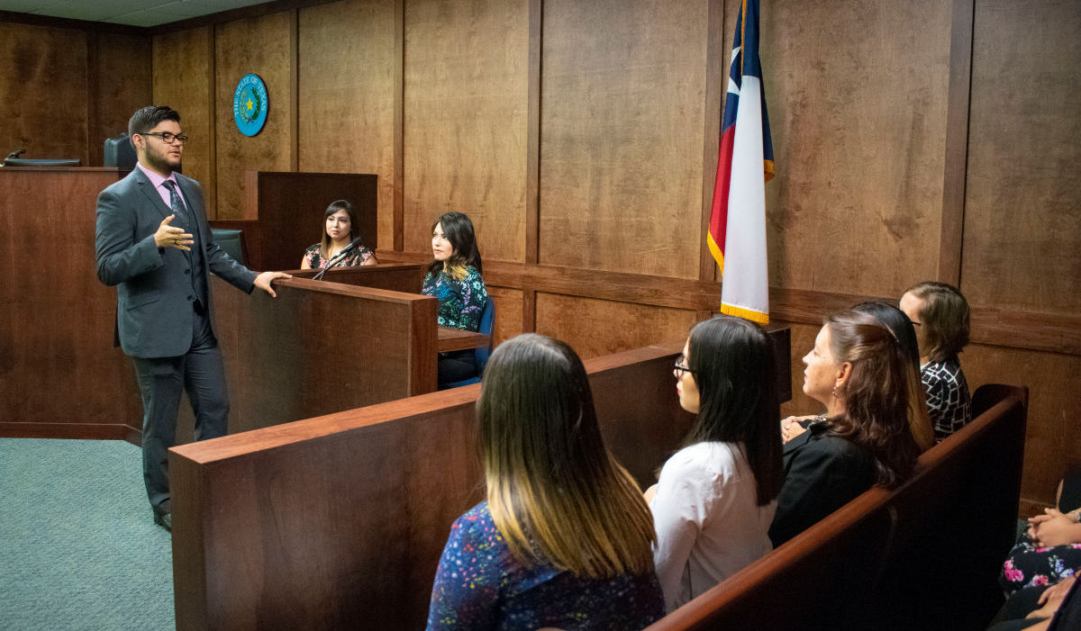 Students using the Del Mar College Captioning Lab Courtroom to enact a mock trial