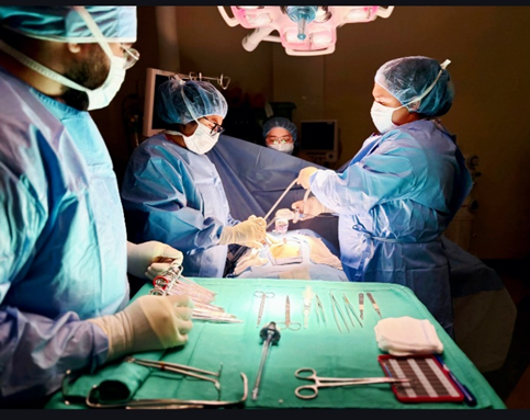 3 Students Preforming Surgery  