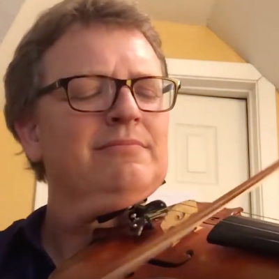 Todd Ehle, Professor of Music, plays fiddle