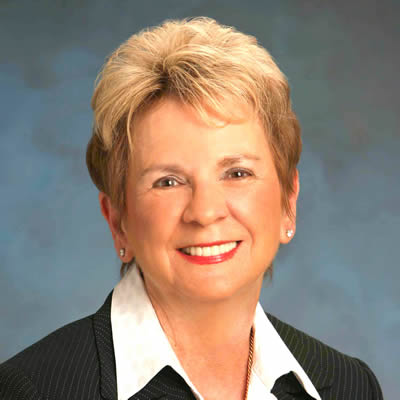Trustee, Mrs. Chris N. Adler