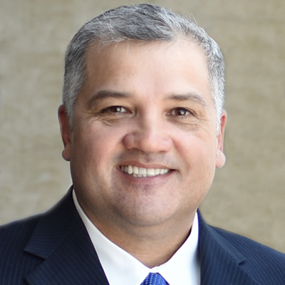DMC President and CEO, Mark Escamilla, Ph.D.