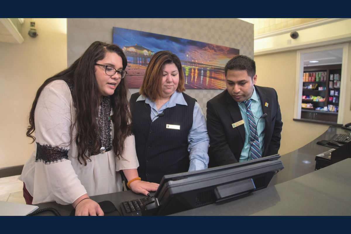Hospitality management students working at a hotel