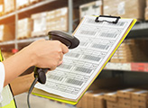 A person scanning barcodes