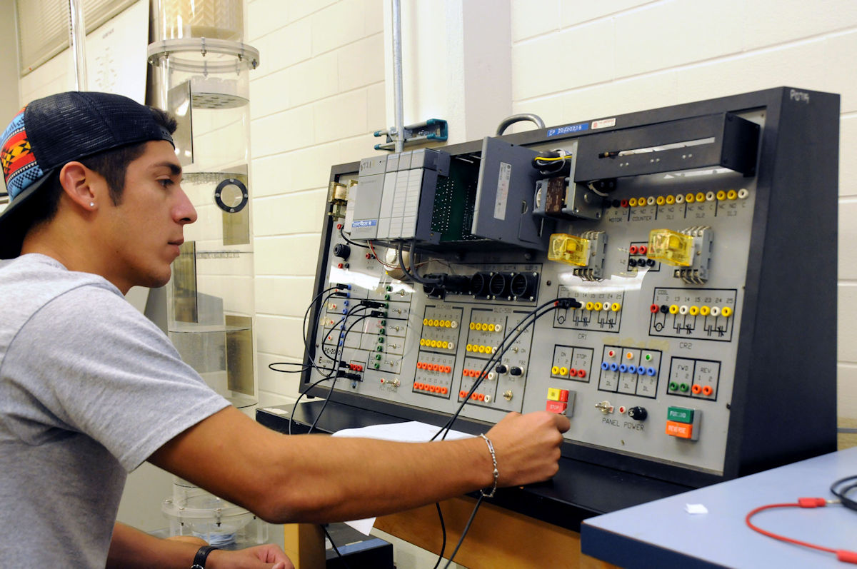 Process technology student at instrument panel