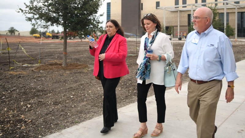 During the May 10, 2022 Del Mar College Board of Regents’ tour of the Oso Creek Campus construction site, Vice President and Chief Academic Officer Dr. Jonda Halcomb (left) discusses the facilities and programs the College will offer with Board Chairwoman Carol A. Scott and District 3 Regent Bill Kelly.